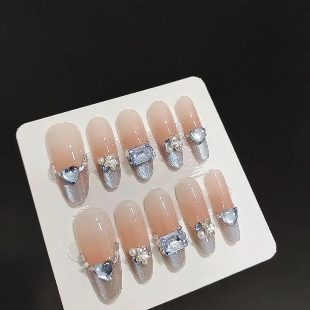 Uñas Postizas Ojo de Gato Ámbar Azul Punta Francesa con Diamantes Ovaladas Largas