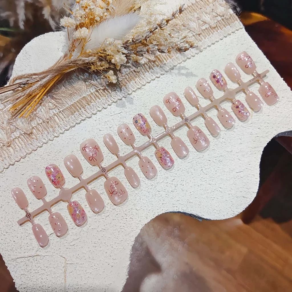 Uñas Postizas Mariposa Rosa con Brillo y Lazo
