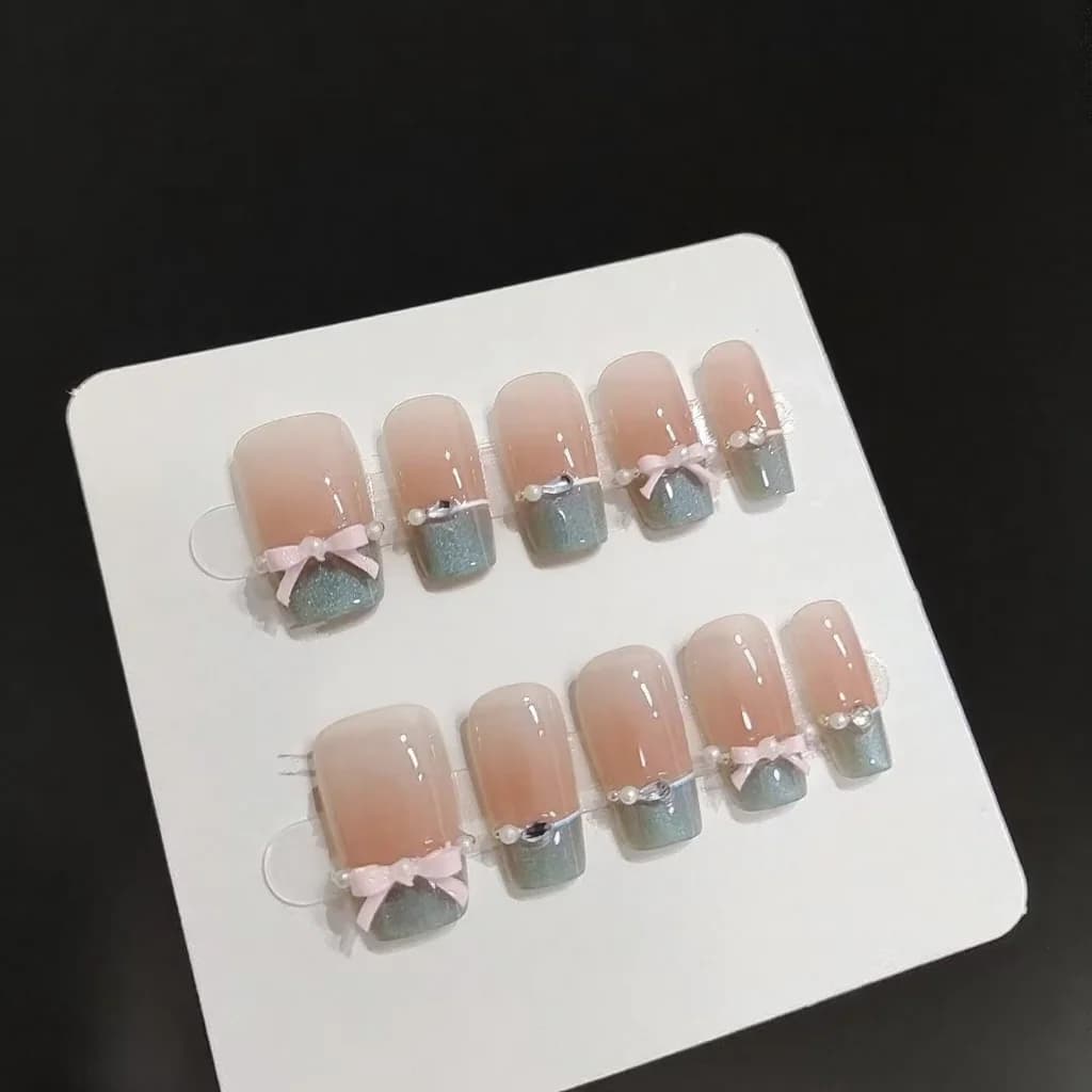 Uñas Postizas Rosa Mariposa con Punta Francesa Ojo de Gato Azul