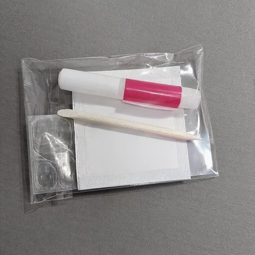 Kit de herramientas para uñas postizas con adhesivos, lima y removedor
