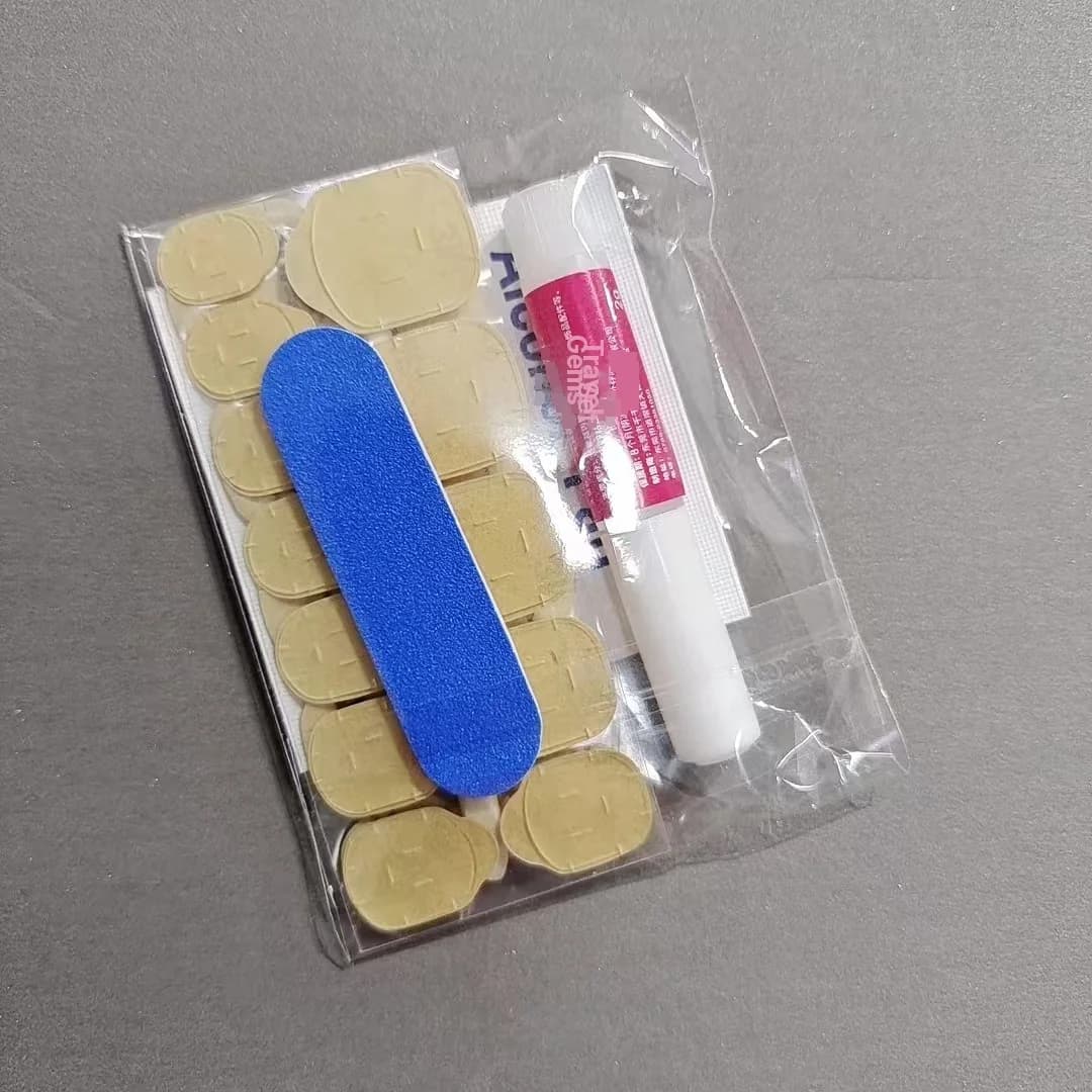 Kit de herramientas para uñas postizas con adhesivos, lima y removedor